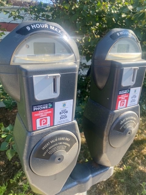 City of Yellowknife Parking Meters with the new Passport Parking Canada stickers.