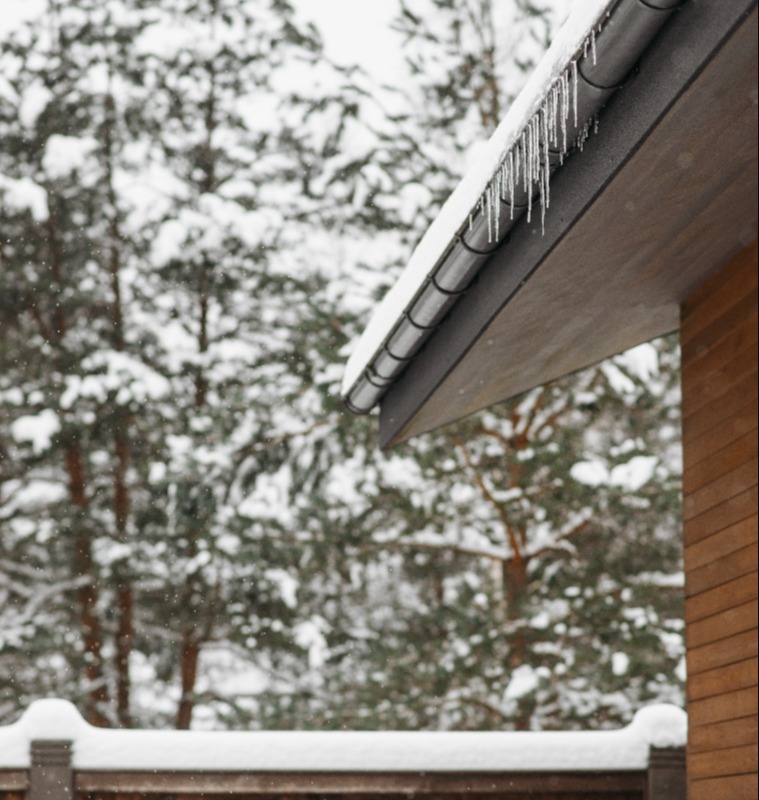Photo of snow melting on a rooftop by Pavel Danilyuk.
