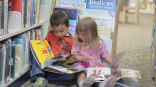 Girl and Boy Reading
