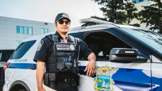 MED officer by the MED vehicle