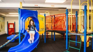 A girl playing at the playground in the Fieldhouse