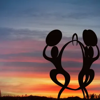 This sculpture, created in 2009 by Yellowknife artist Francois Thibault depicts three drum dancers. It is located at the edge of Frame Lake in front of Yellowknife's City Hall.