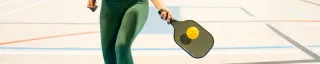Woman playing pickleball