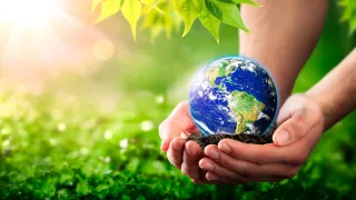 Earth held in hands