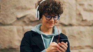 a person listening to audio resources