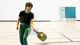 Woman playing pickleball