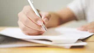 Person filling in a form