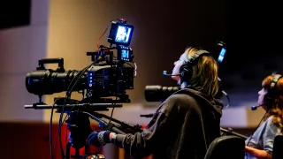Two filmmakers filming