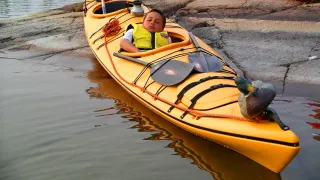 Tired Kid on Canoe 