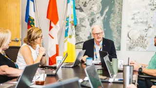 Stephen Van Dine in a meeting