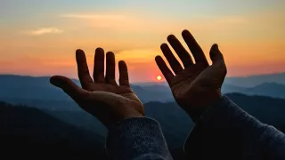 Hands spread wide to embrace the nature