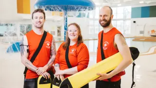 3 lifeguards at the pool